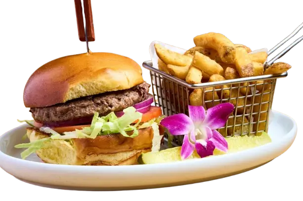 Crispy chicken sandwich on a hero roll with sweet potato fries and a pickle at Seymour's Cafe in Livingston, NJ